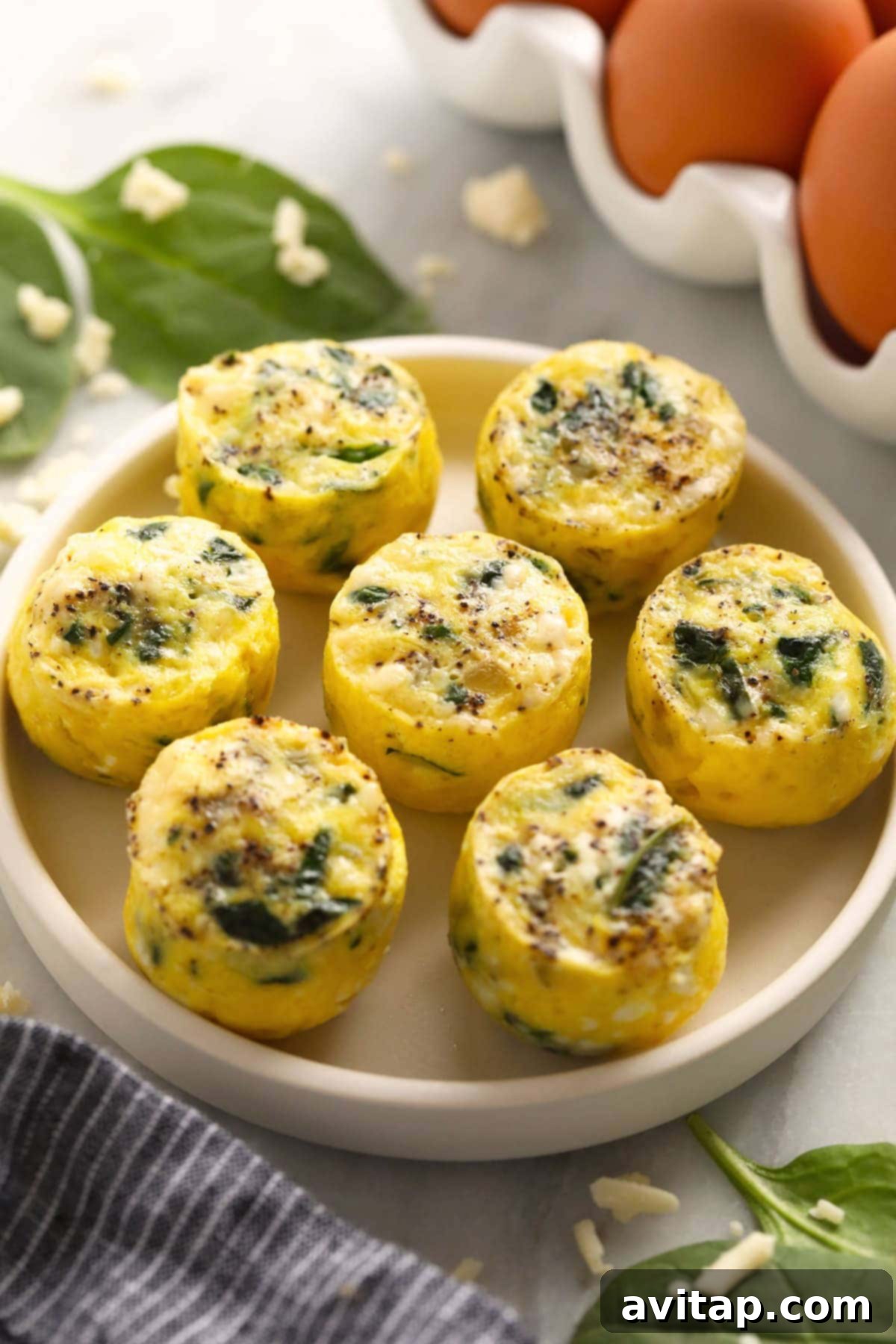 Fluffy Instant Pot Egg Bites 5 Egg bites on a plate, showcasing their fluffy texture.