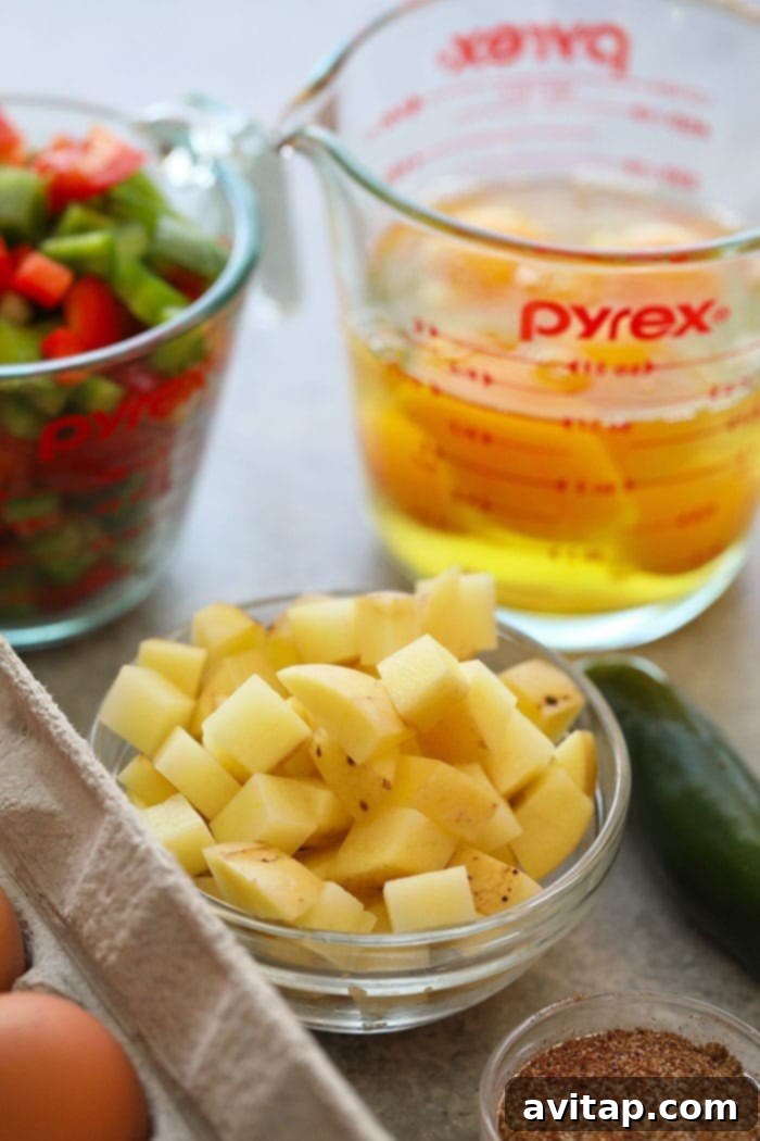 Preparation shot of ingredients for chicken fajita breakfast casserole, including diced vegetables and sausage