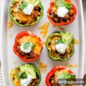 Fiesta-Filled Bell Peppers 13 Plated Mexican stuffed peppers, ready to be enjoyed.