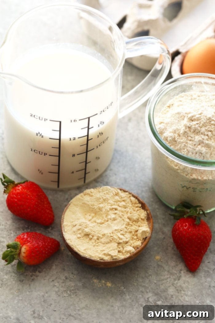 Ingredients for healthy protein waffles laid out on a kitchen counter