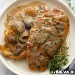 Plated Chicken Marsala with rich mushroom sauce
