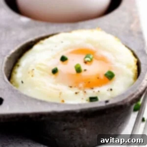 A perfectly baked egg, golden and inviting, ready to be served.