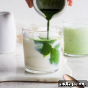 Iced matcha latte in a glass with ice, perfect for a quick and easy refreshing drink.