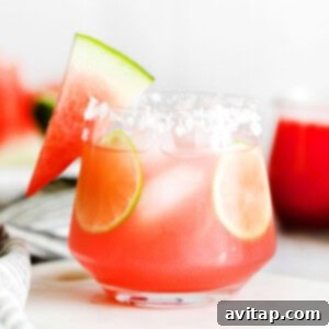 A refreshing watermelon margarita in a glass, ready to be enjoyed.