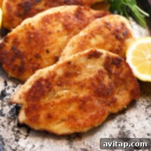 Crusted chicken with a golden crispy exterior.