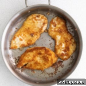pan frying chicken.