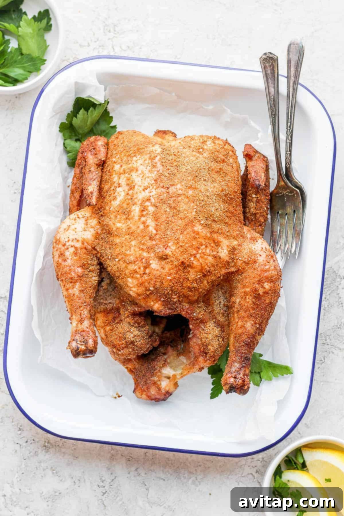 Slow-Smoked Whole Chicken 2 A perfectly smoked whole chicken with a golden-brown, crispy dry rub crust, ready to be served.