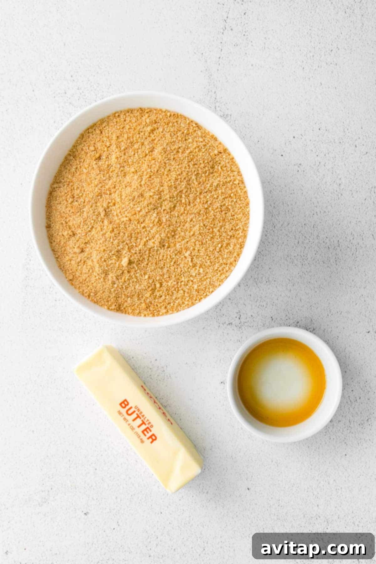 Essential ingredients for a delicious homemade graham cracker crust, laid out on a clean surface.