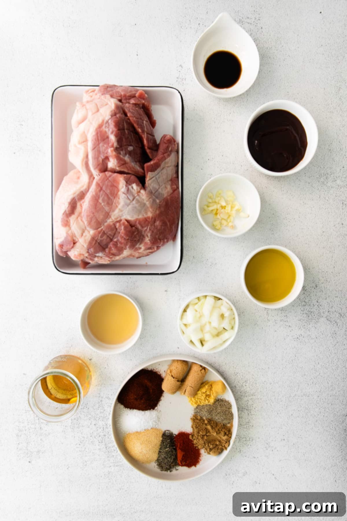 Essential ingredients for your slow cooker pulled pork masterpiece Ingredients for slow cooker pulled pork laid out on a kitchen counter