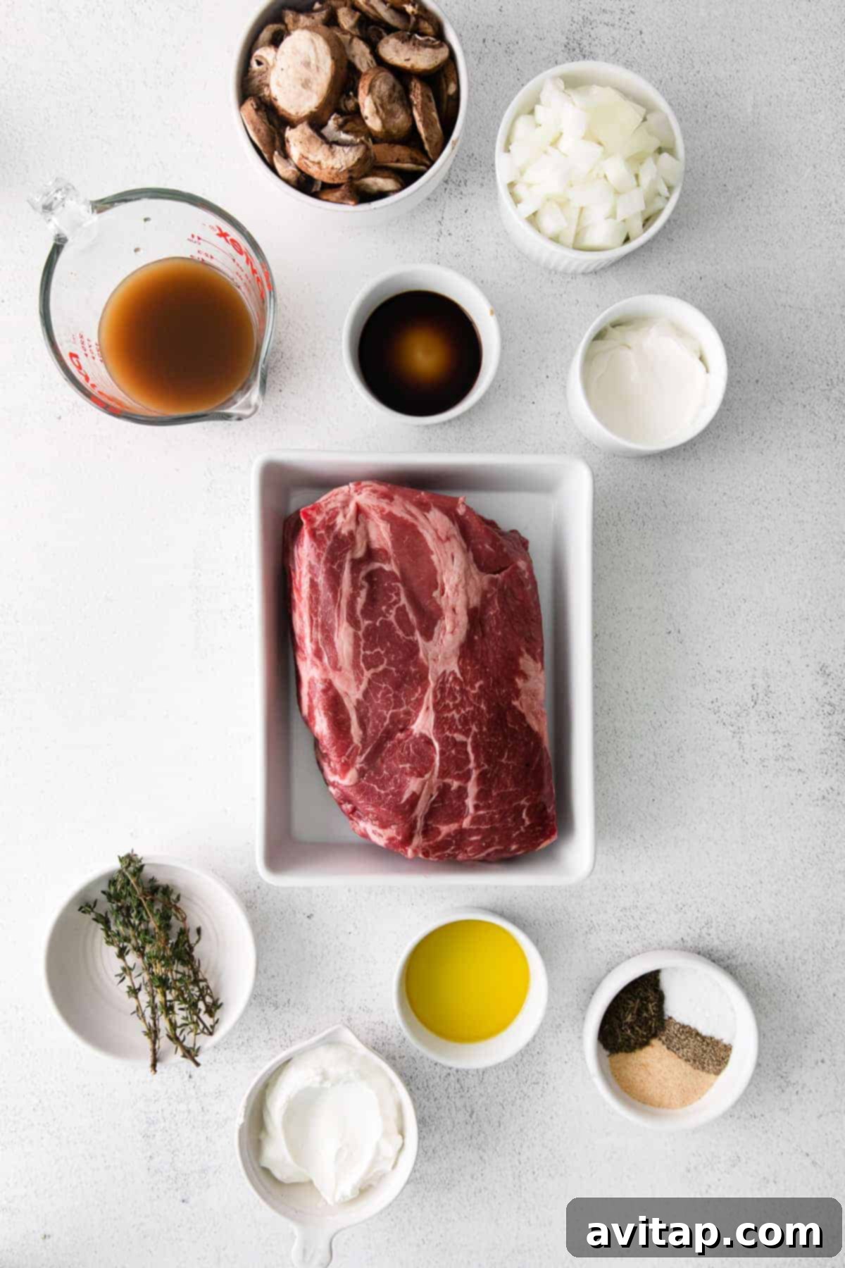Ingredients for Slow Cooker Beef Stroganoff displayed in bowls