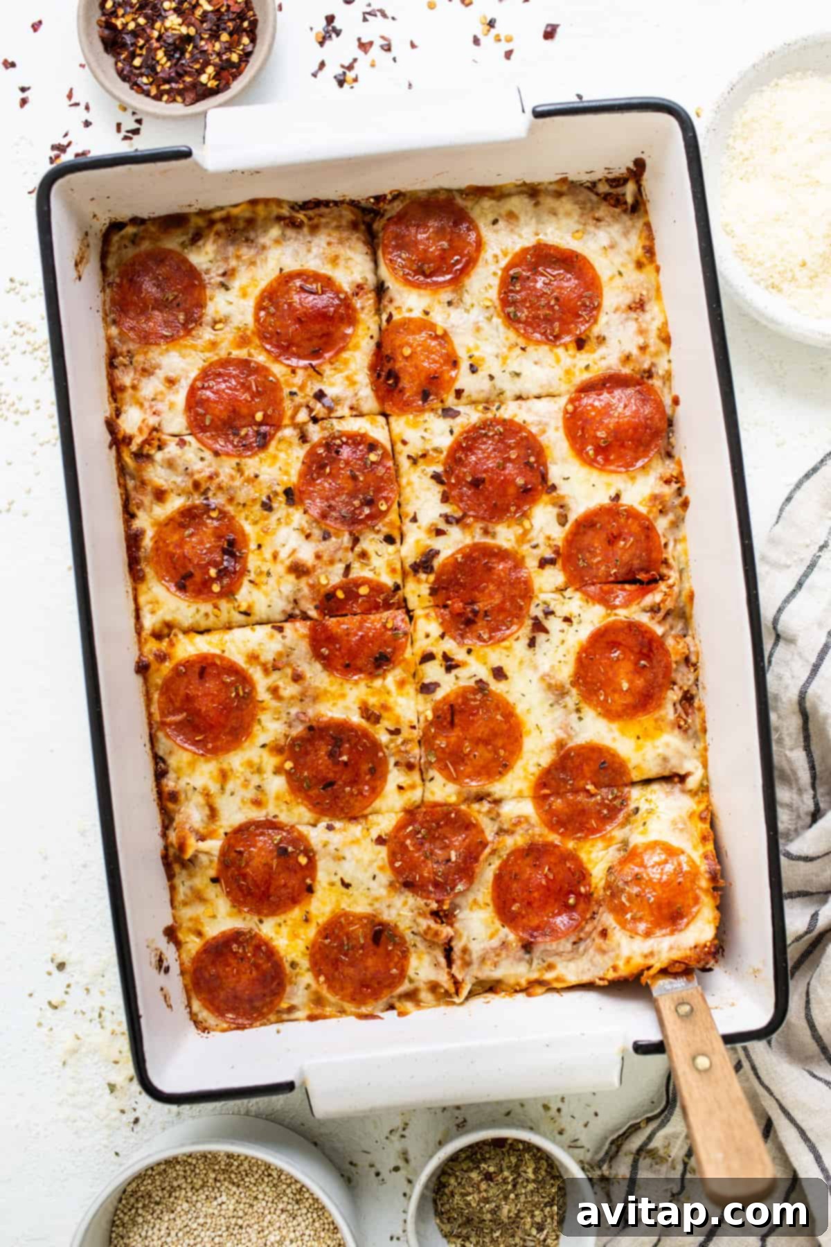 Easy Pizza Quinoa Bake 2 Pepperoni pizza in a baking dish, ready to be served.