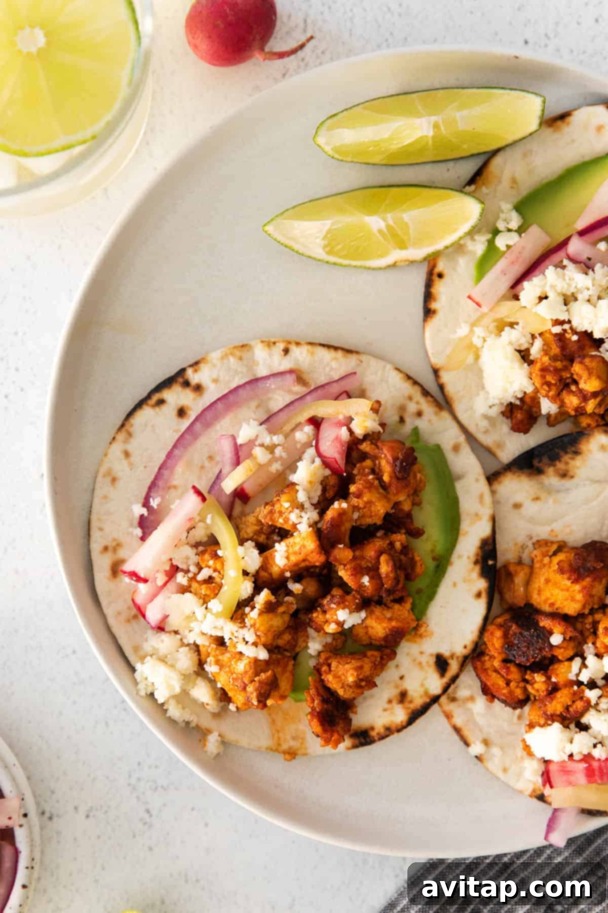 Flavorful Tofu Tacos 2 Tofu tacos on a plate