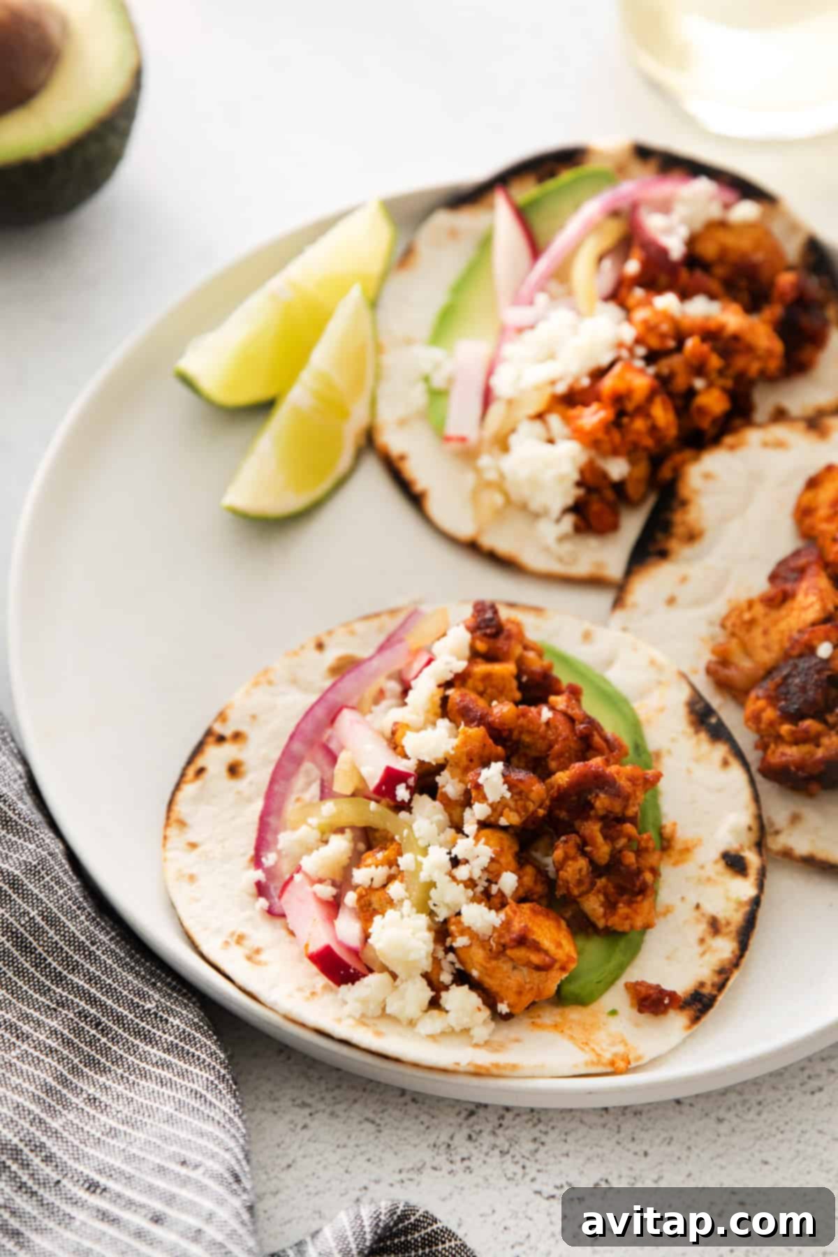 Flavorful Tofu Tacos 10 Tofu tacos with slaw and avocados.