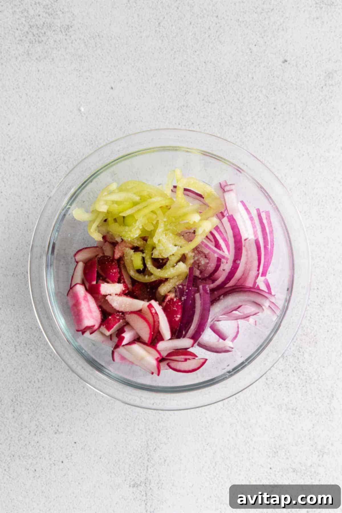 Flavorful Tofu Tacos 4 A radish slaw with banana peppers, red onion, and radishes.
