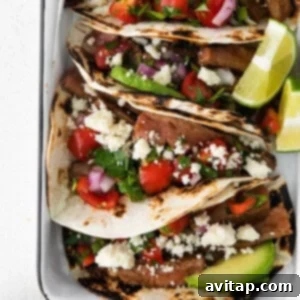 Mexican steak tacos seasoned and baked in a dish.