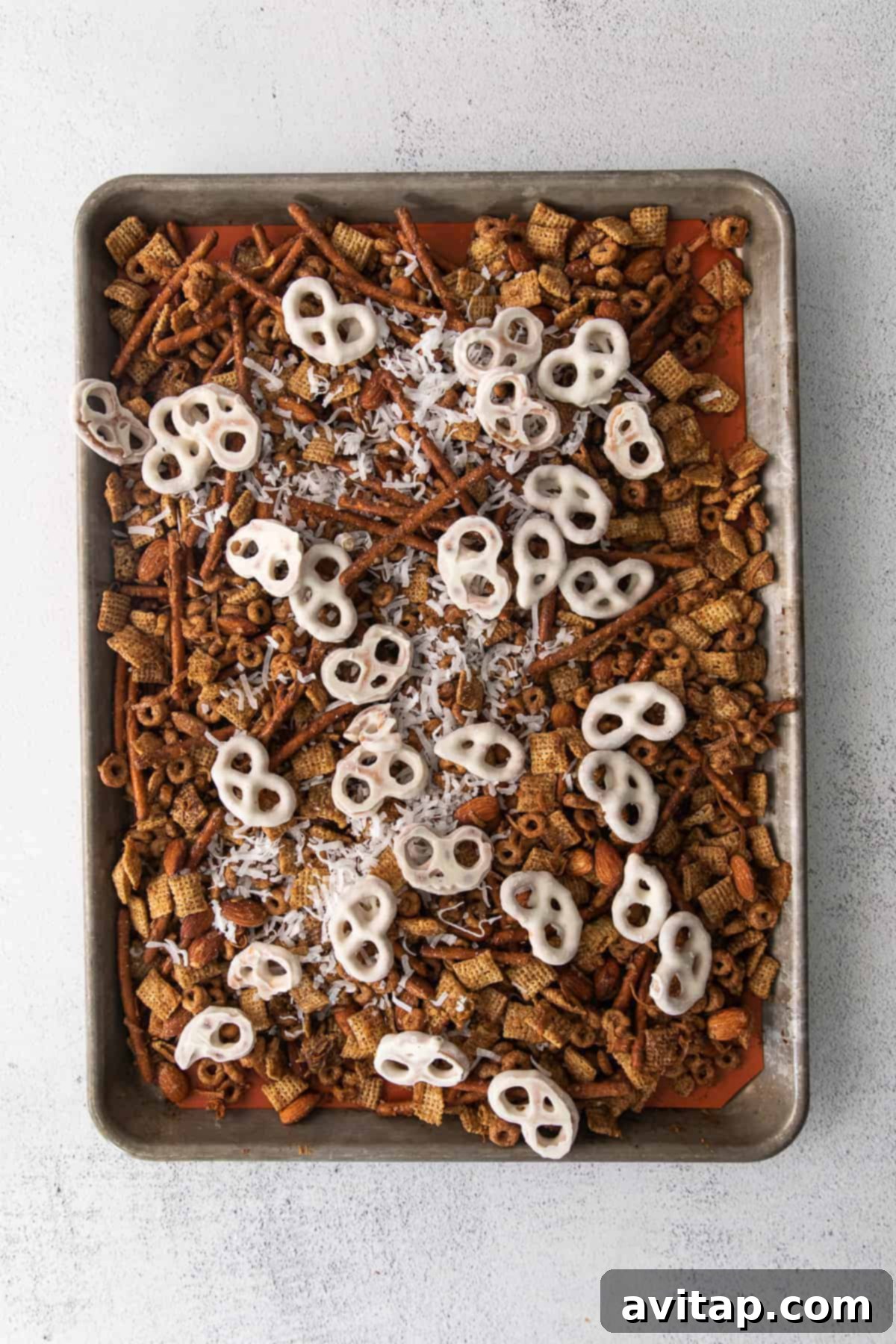 A close-up shot of the finished Chai Chex Mix, highlighting its diverse ingredients and crunchy texture.