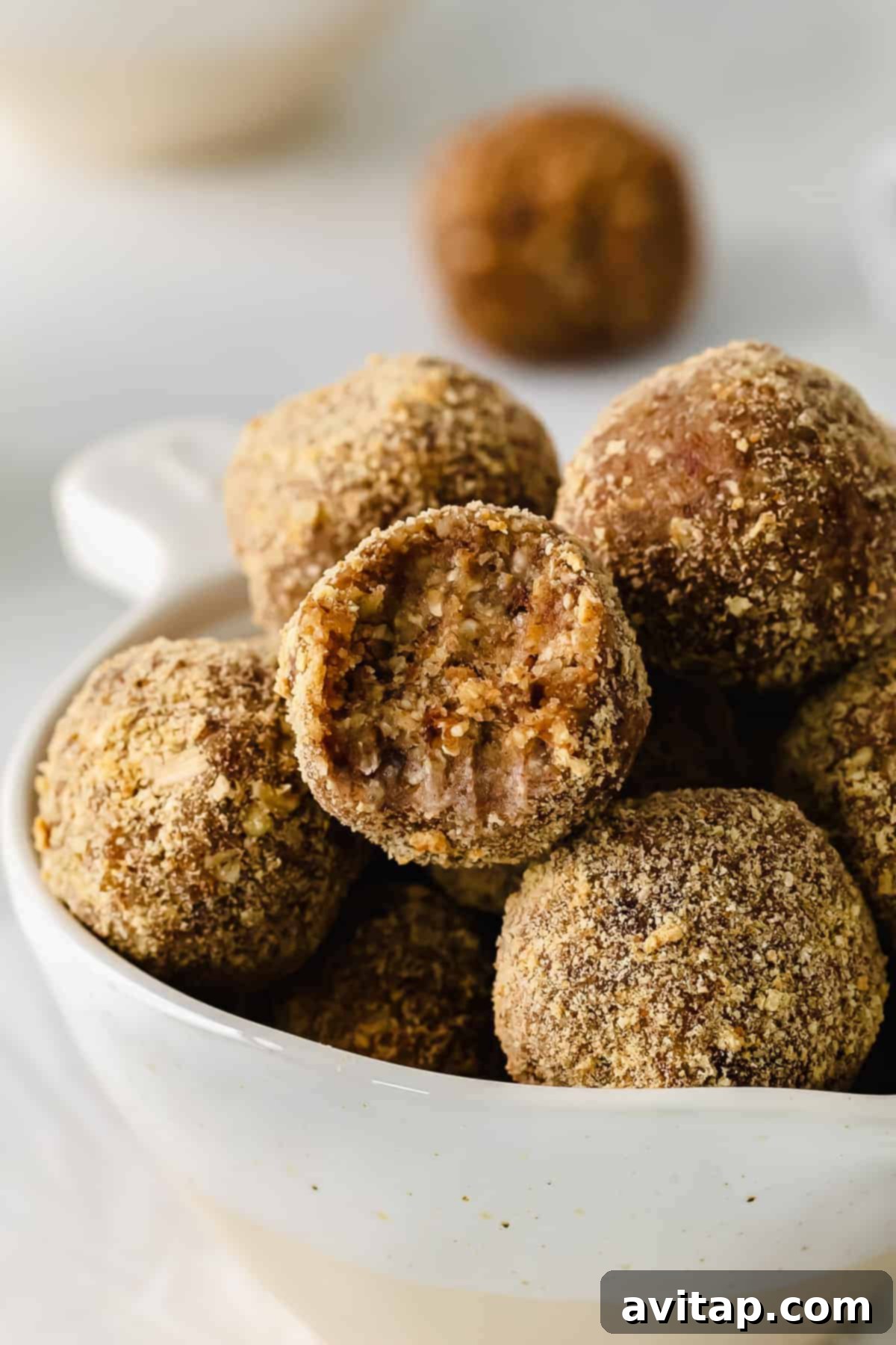 A bowl filled with delicious pecan pie energy balls, ready to be enjoyed.