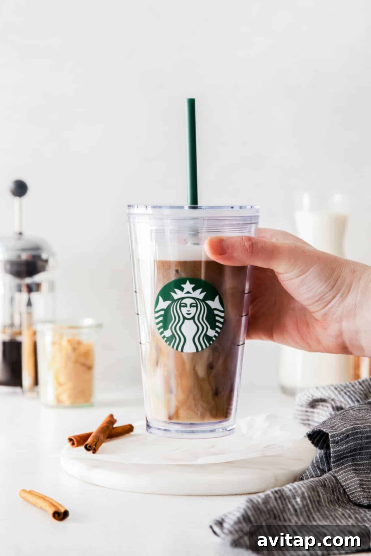 Iced Brown Sugar Oat Milk Shaken Espresso Layers An Iced Brown Sugar Oat Milk Shaken Espresso in a glass, showcasing its layers.