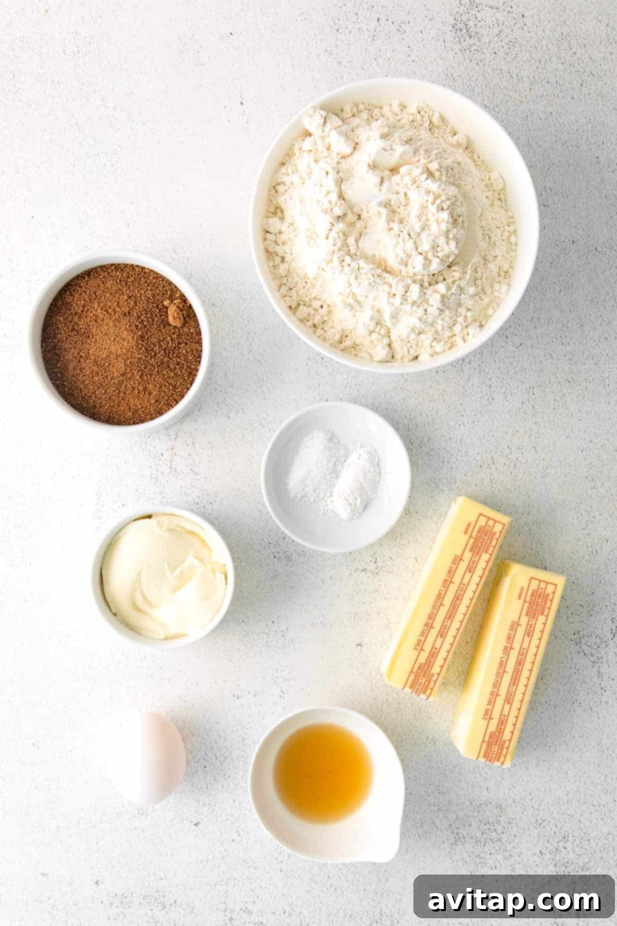 close-up view of fresh ingredients for maple sugar cookies laid out on a kitchen counter