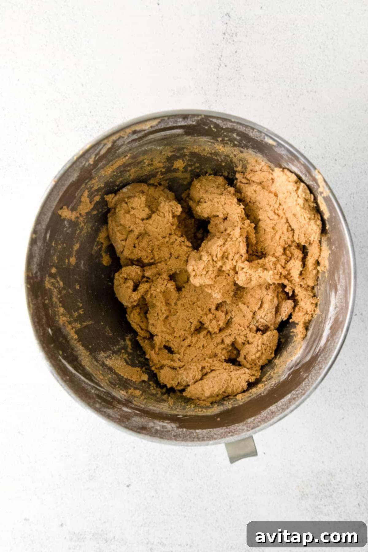 creamy cookie dough swirling in a mixing bowl, ready for chilling