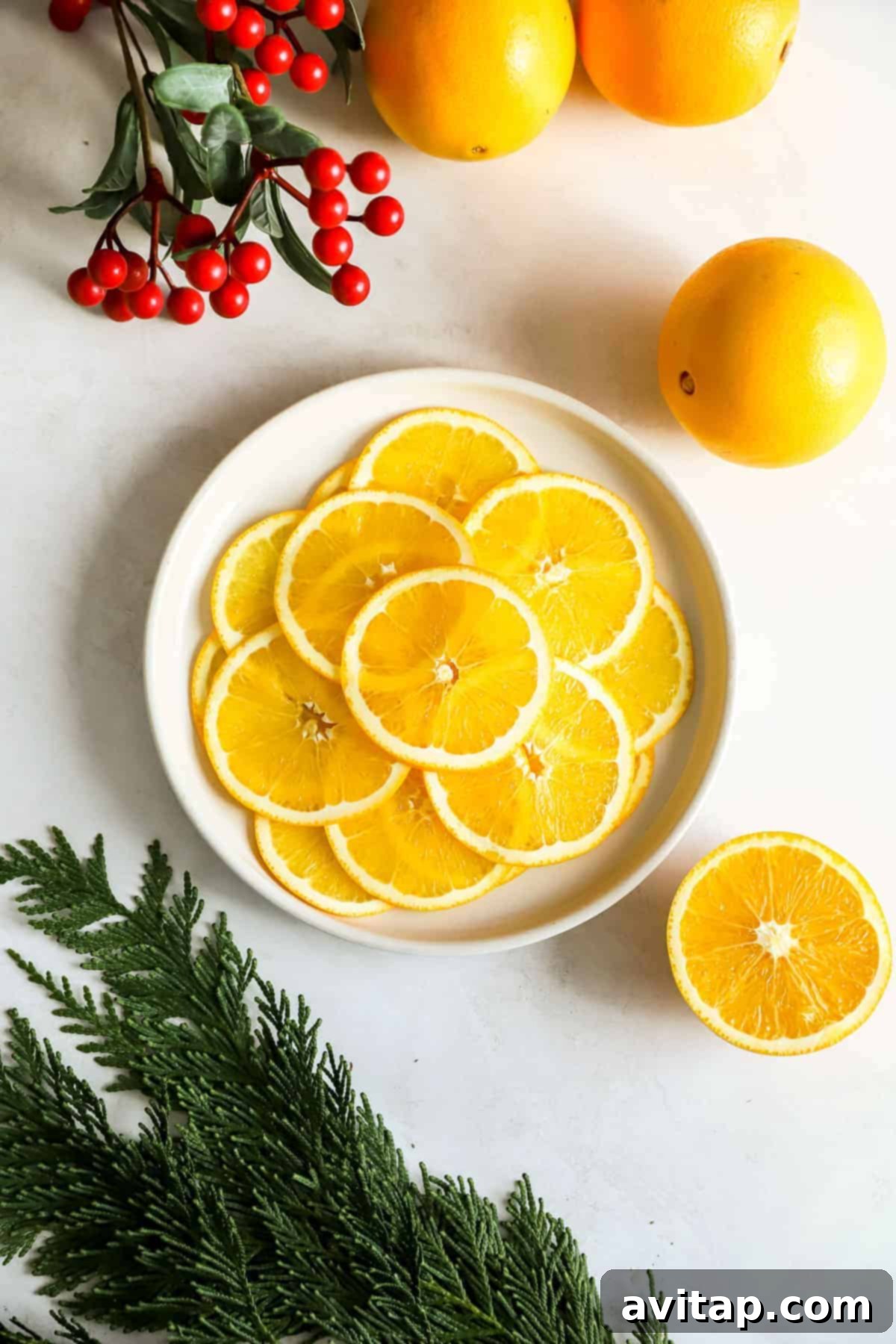 Achieve Perfect Dried Orange Slices with This Essential Tool A mandoline slicer, the essential tool for perfect dried orange garland slices