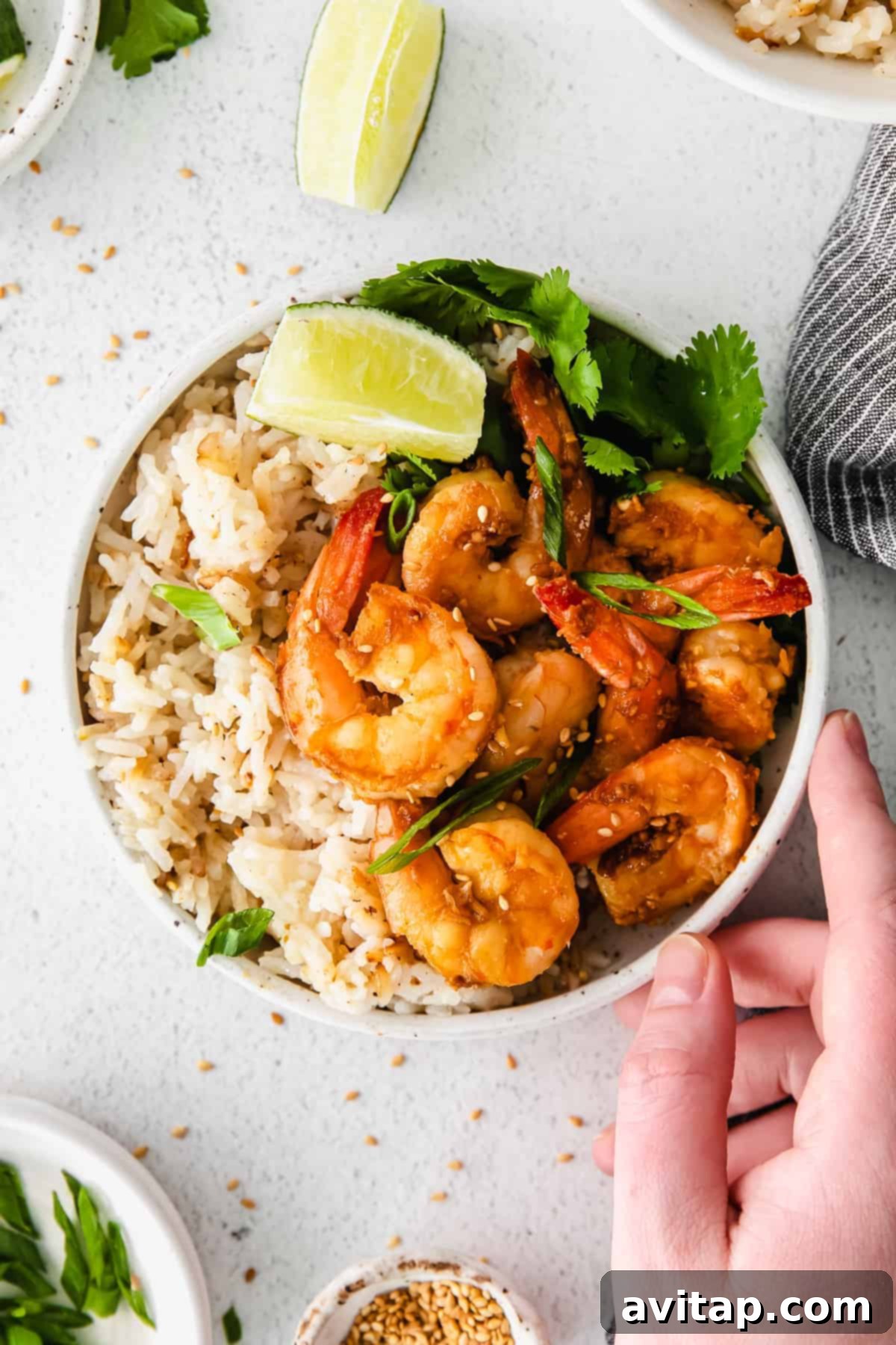 Garlic Butter Shrimp 9 Sautéed shrimp and rice in a bowl, ready to be served.