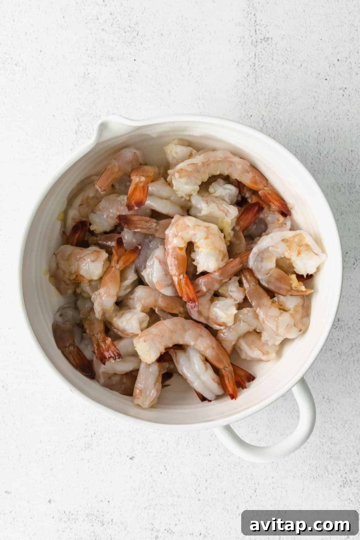 Garlic Butter Shrimp 4 Raw shrimp ready for marinating and cooking.