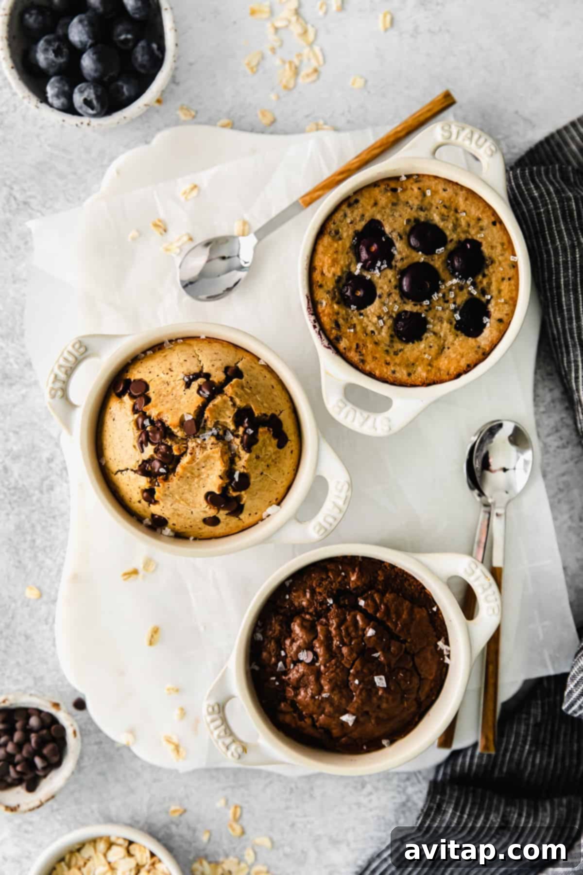 Blended Baked Oatmeal: A Healthy and Delicious Breakfast Solution Blended baked oatmeal in ramekins, showcasing a perfect fluffy texture for a delightful breakfast or dessert-like snack.