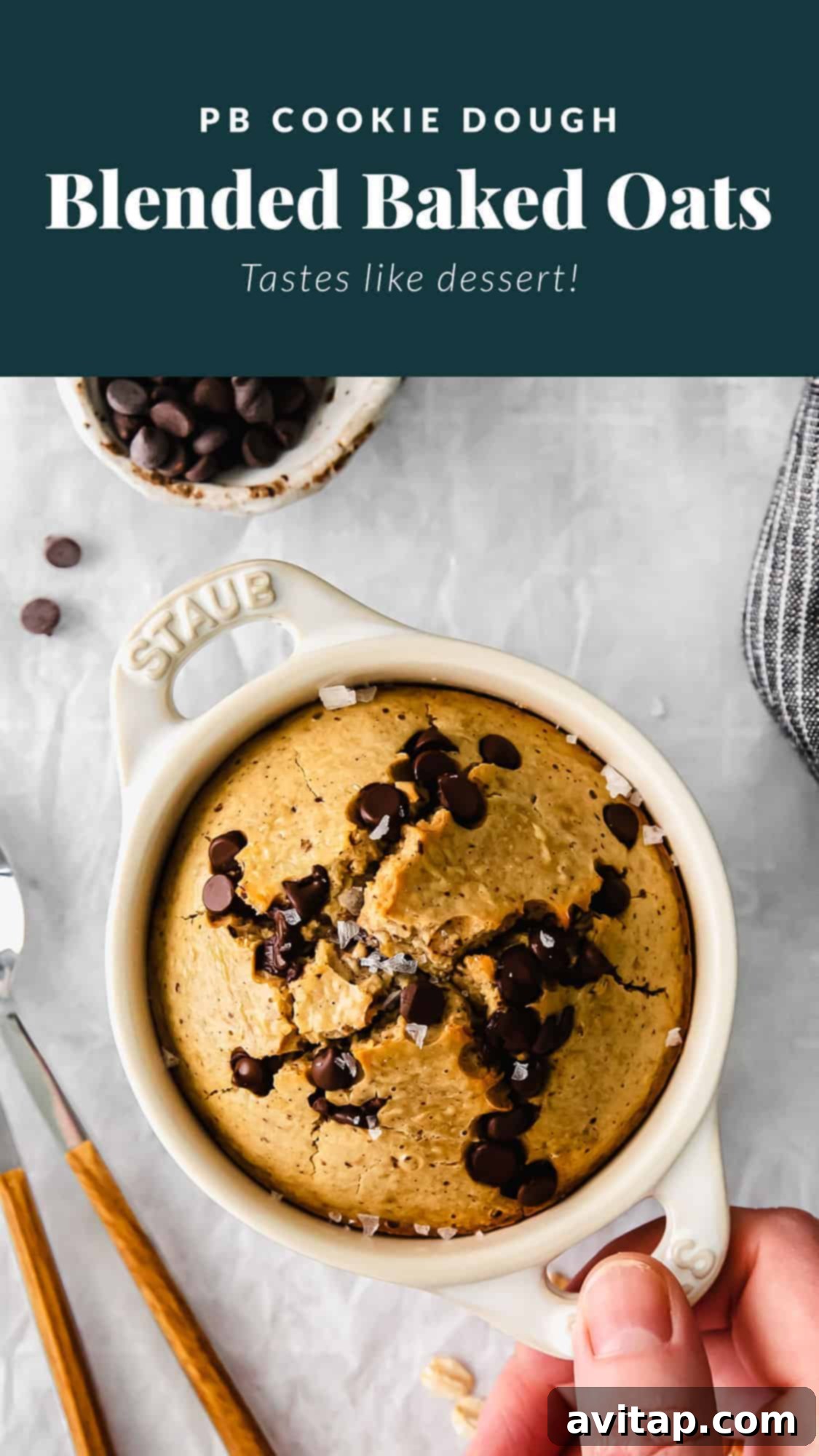 Peanut Butter Cookie Dough Blended Baked Oats with Chocolate Chips A serving of blended baked oatmeal in a jar, showcasing its fluffy texture and delicious toppings, possibly chocolate chips.
