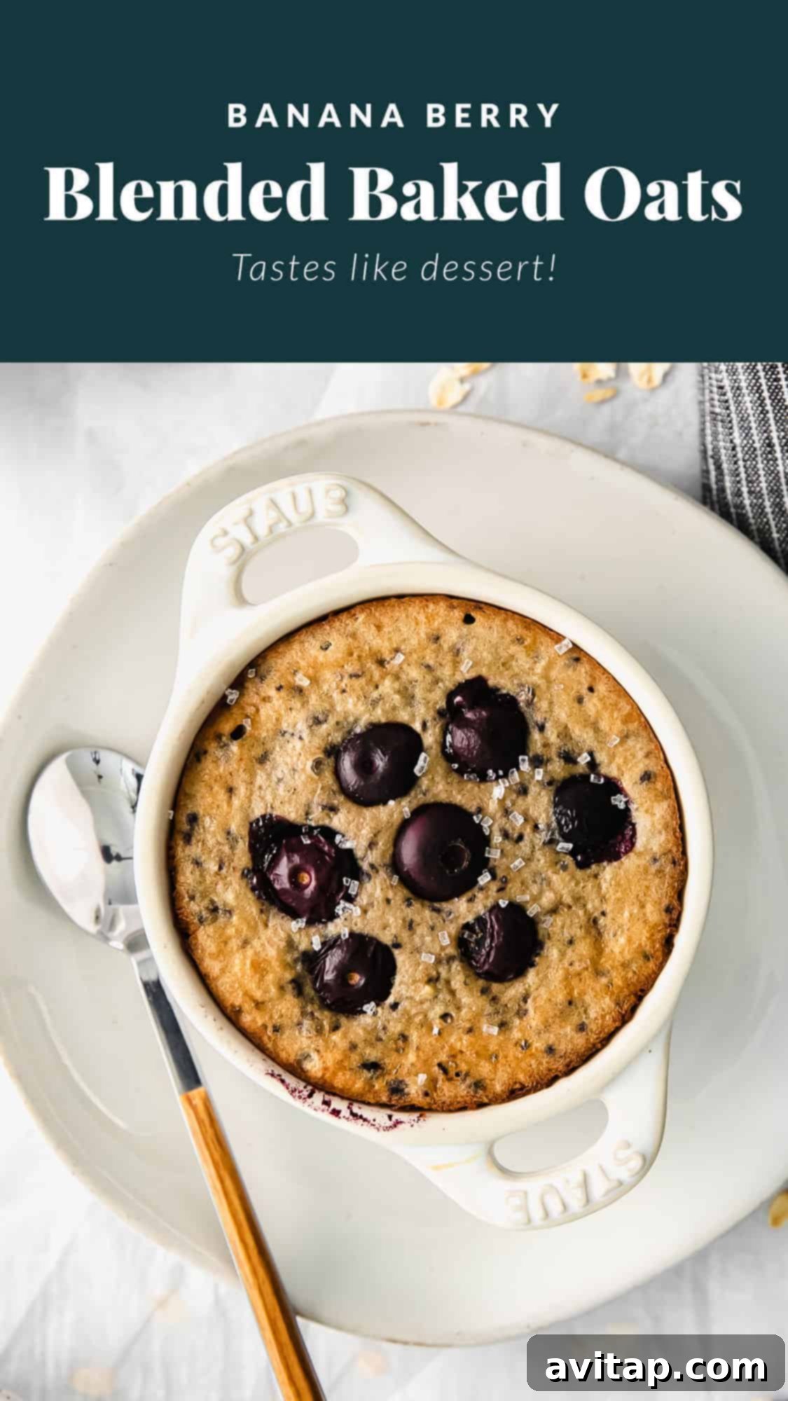 Refreshing Banana Berry Blended Baked Oats A beautifully presented serving of blended baked oatmeal, garnished with fresh berries and a drizzle of honey.