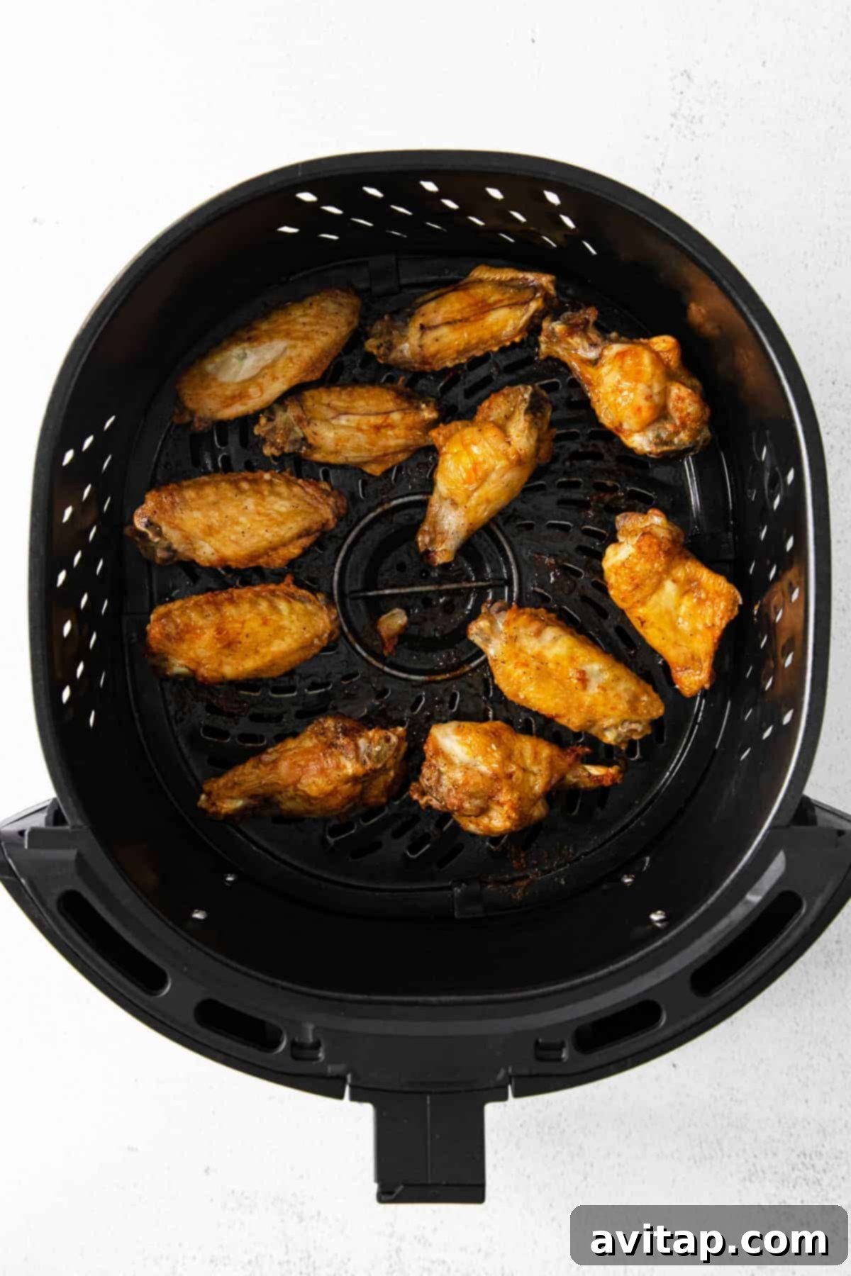Chicken wings in air fryer.