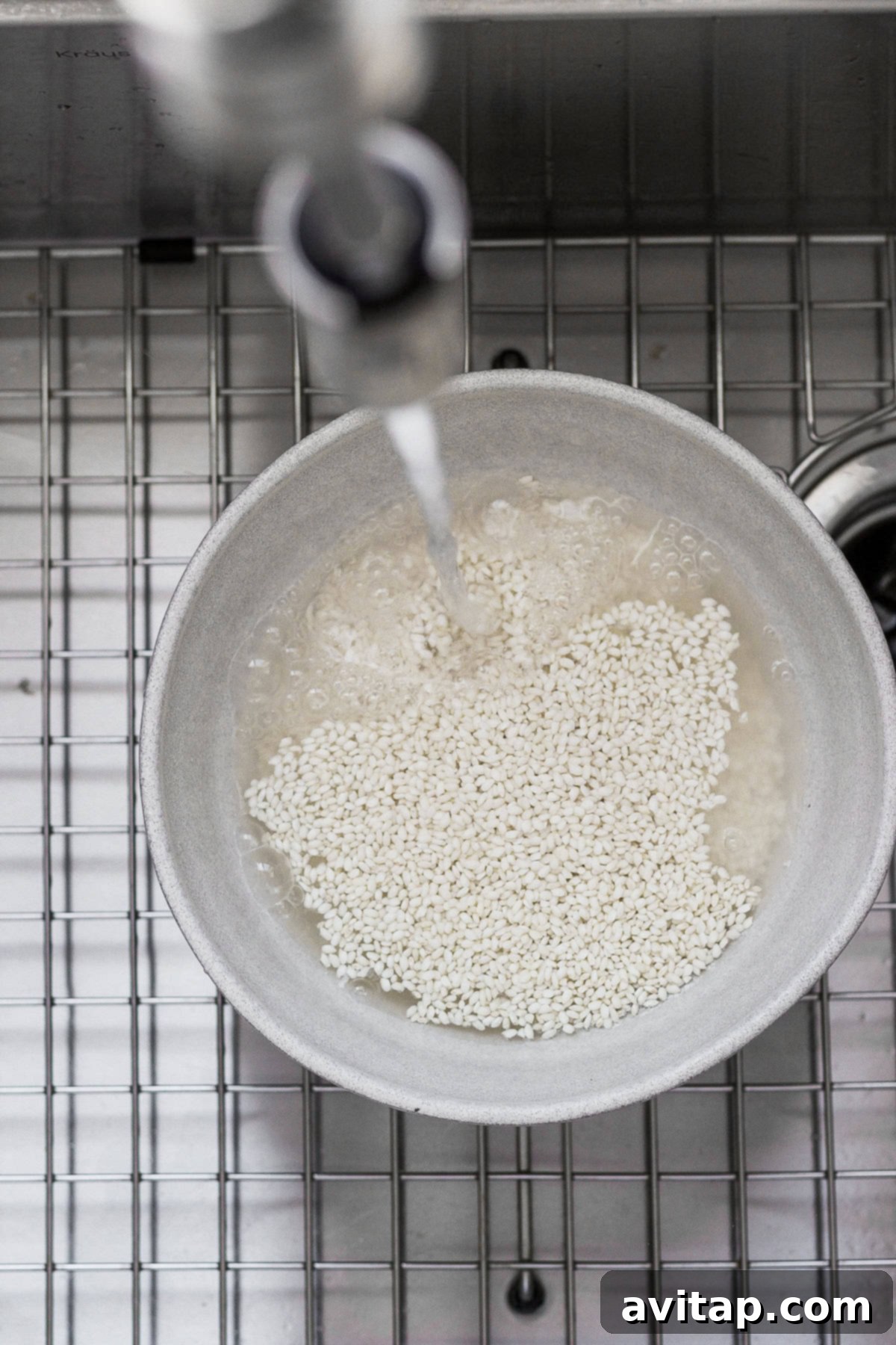 Sticky rice is a very versatile recipe to pair with many Asian-inspired dishes. Make sticky rice in your own kitchen with our step by step instructions. Enjoy! Sweet rice soaking in a bowl of warm water, preparing for the steaming process.