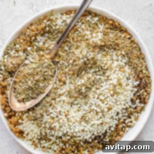 A dish of za'atar seasoning, ready to be used in various recipes.
