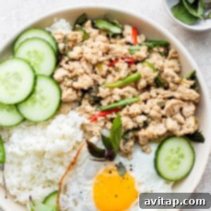 Savory Pork Dumplings 2 A vibrant bowl of Thai Basil Chicken Stir Fry, garnished with fresh basil