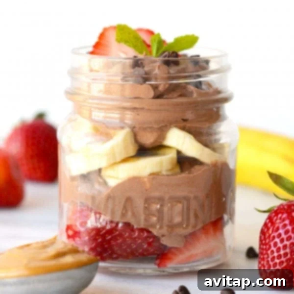 Guilt-Free Chocolate Peanut Butter Indulgence 2 Close-up of healthy chocolate peanut butter mousse with a spoon ready to be enjoyed