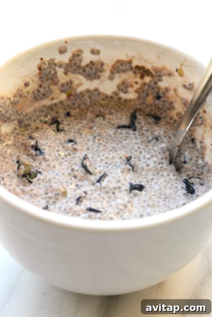 A large mixing bowl filled with creamy blueberry chia seed pudding, indicating a generous batch.