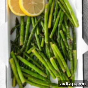 Crispy Air Fryer Asparagus 8 Air Fryer Asparagus on a platter, ready to serve.