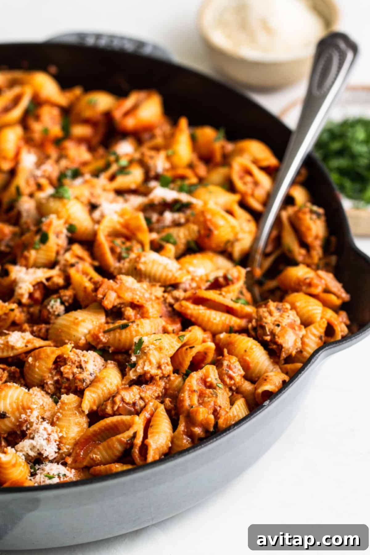 Cast Iron Skillet with Ground Turkey Pasta Ground turkey pasta plated in a cast iron skillet.