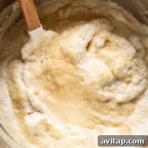 Egg whites gently folded into pancake batter, creating a light and airy mixture