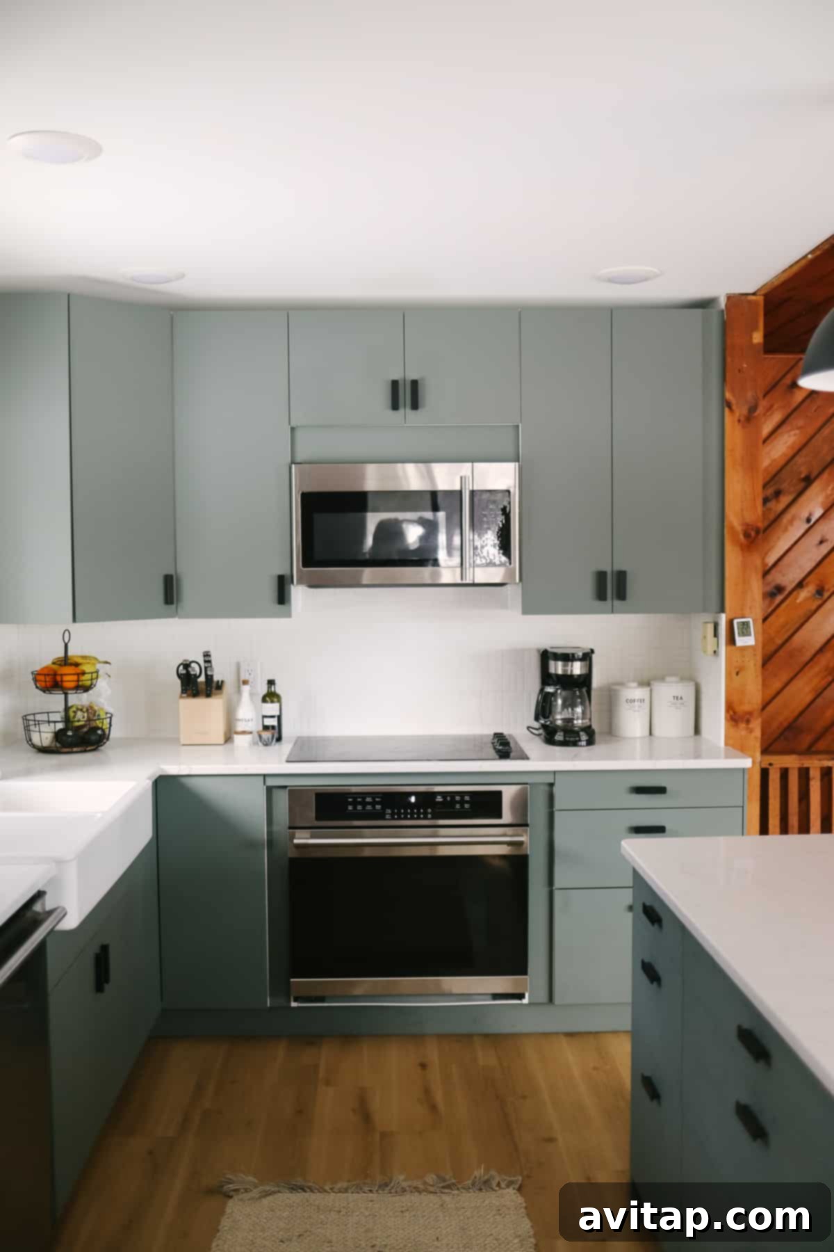 Photo of an IKEA microwave and cooktop, showcasing a modern and functional kitchen setup.