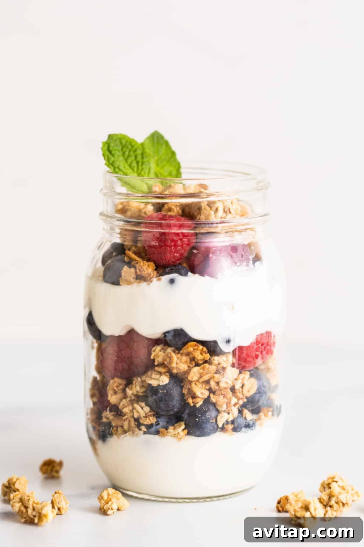 Yogurt parfait beautifully layered in a mason jar