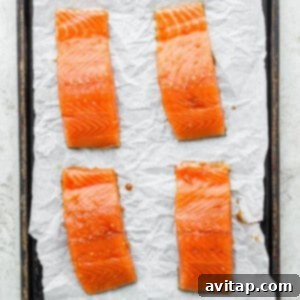 Salmon fillets on a baking sheet.