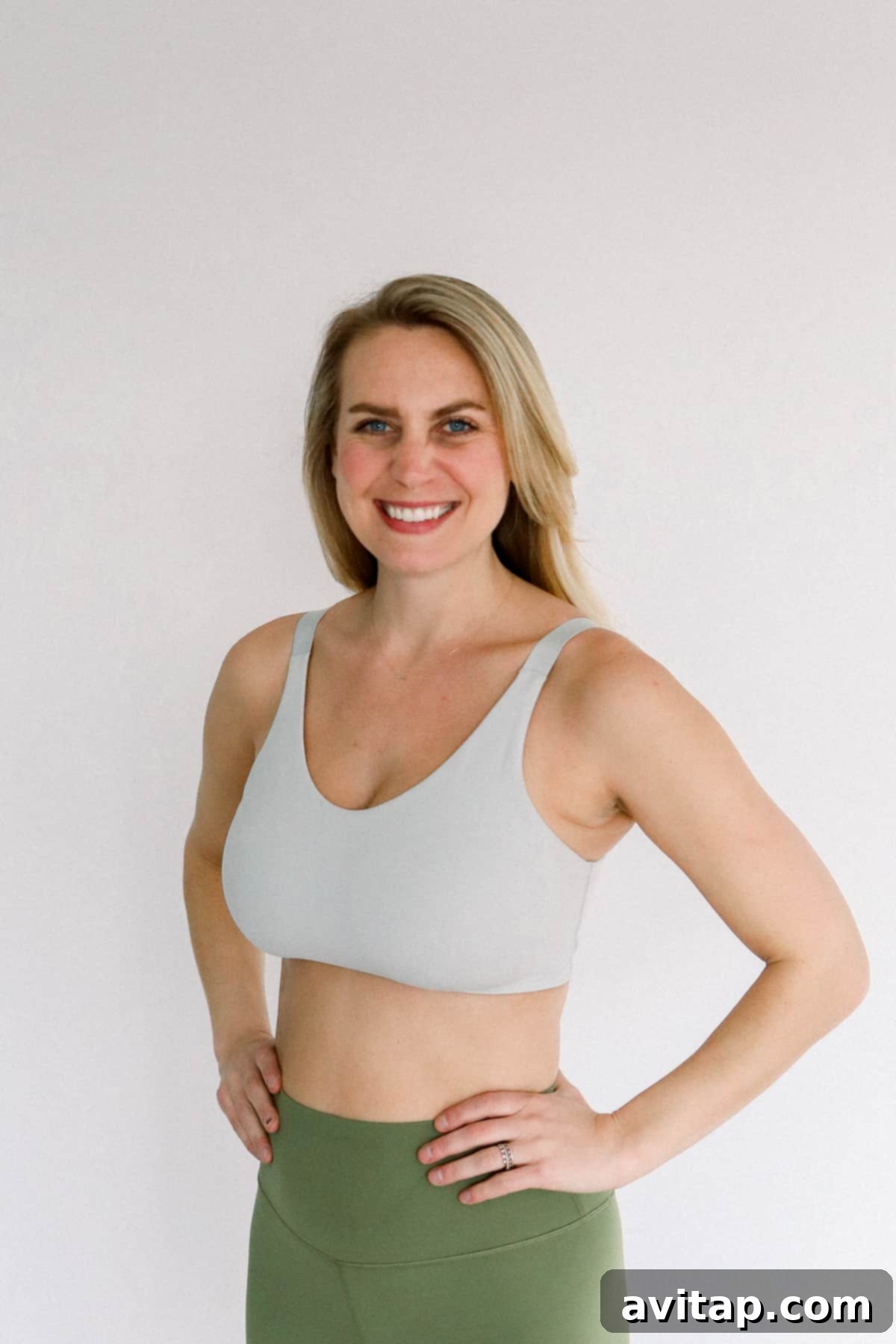 Lululemon Everyday Bra for Pregnancy Woman wearing a Lululemon In Alignment Bra, showcasing its versatile design and comfortable fit.