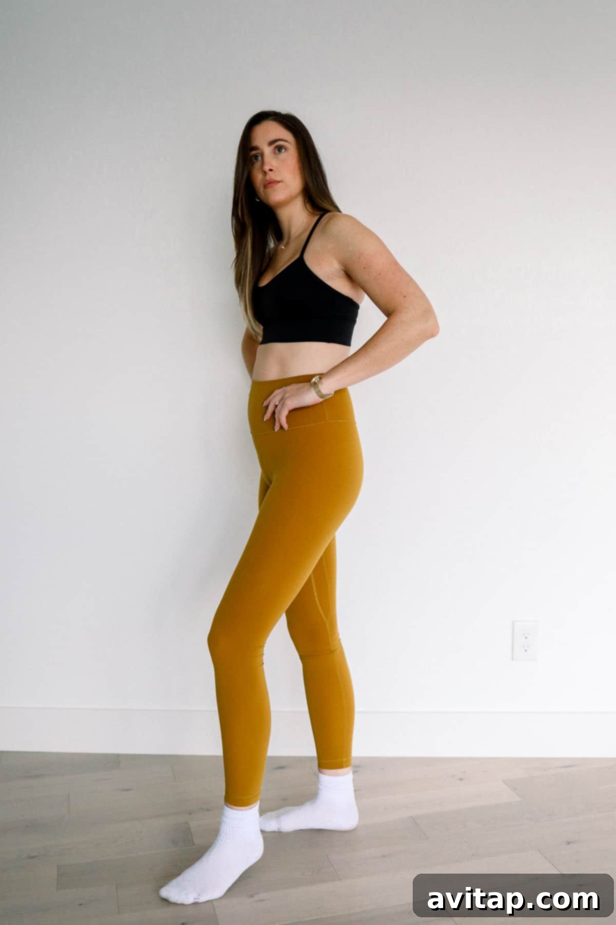 Lululemon Align Leggings for Pregnancy Woman wearing Lululemon Align leggings, emphasizing their flexible and comfortable fit for pregnancy.