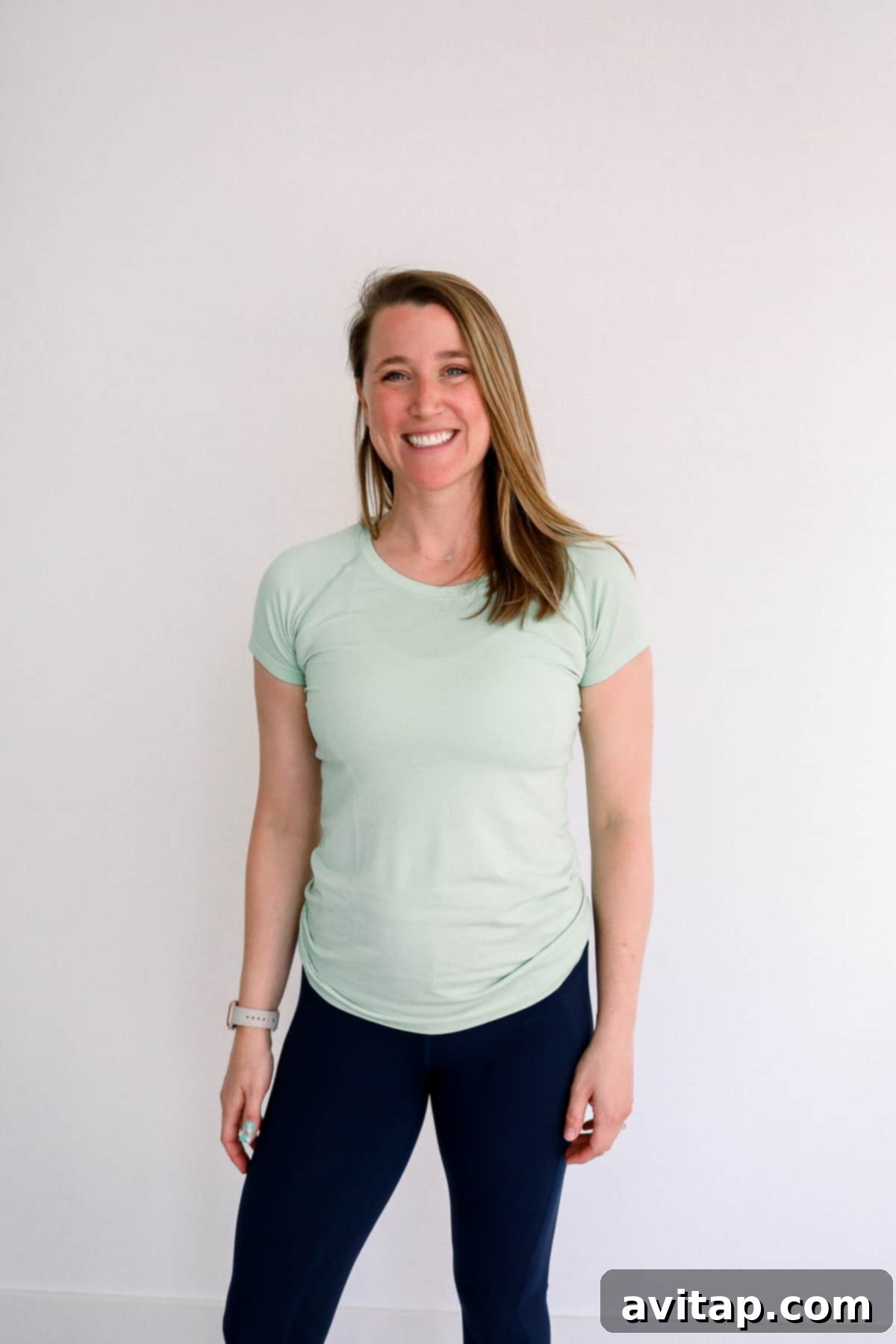 Lululemon Short Sleeve for Pregnancy Woman wearing a Lululemon Swiftly Tech Short Sleeve shirt, ideal for staying cool and active.