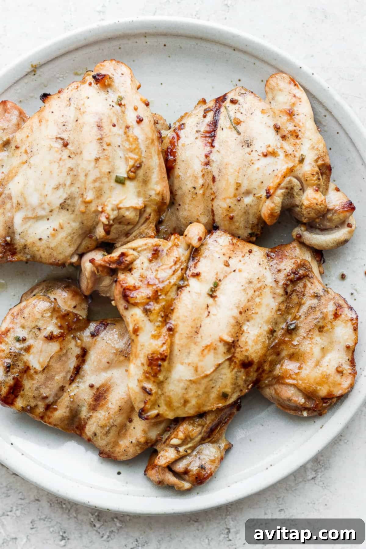 boneless chicken thighs on plate.