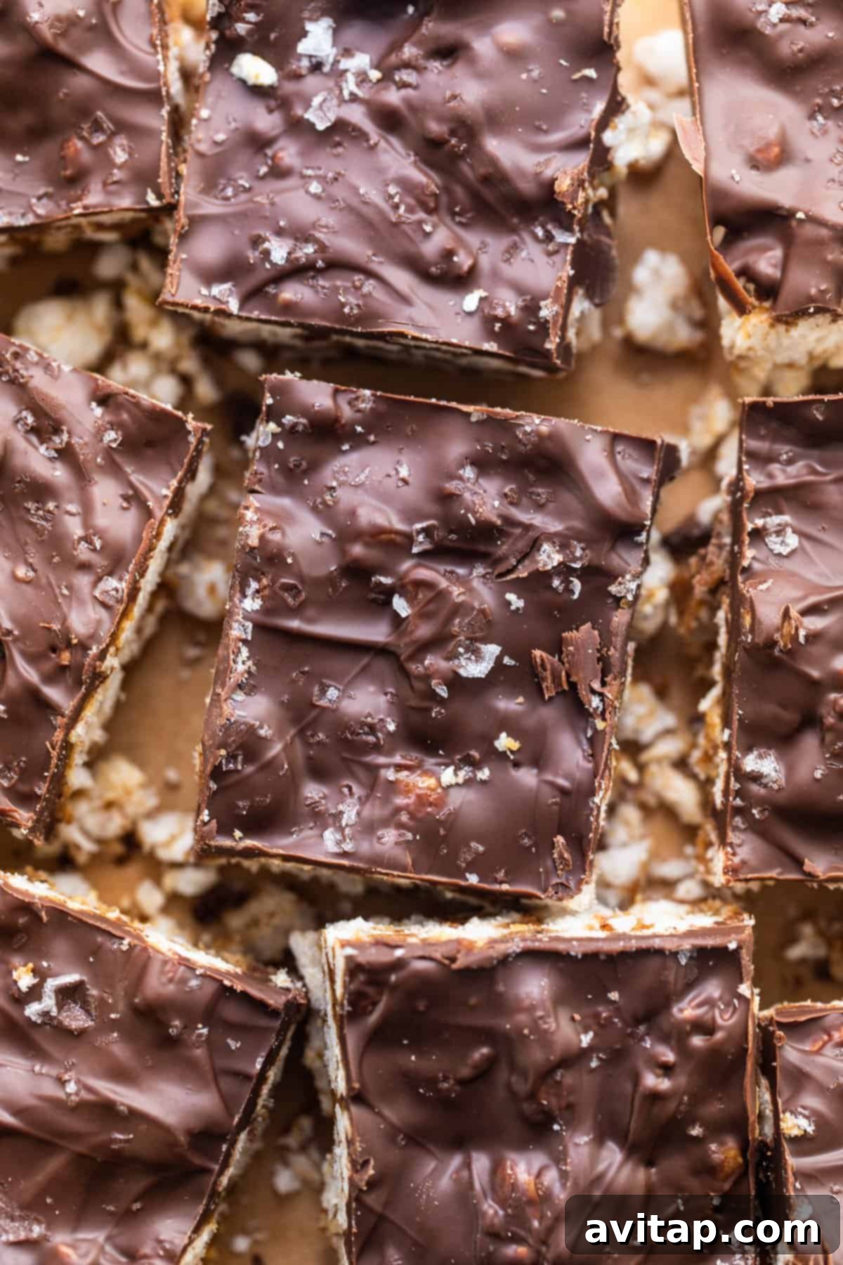 A plate showcasing more delicious chocolate-covered graham cracker bars, ready for sharing or indulging.