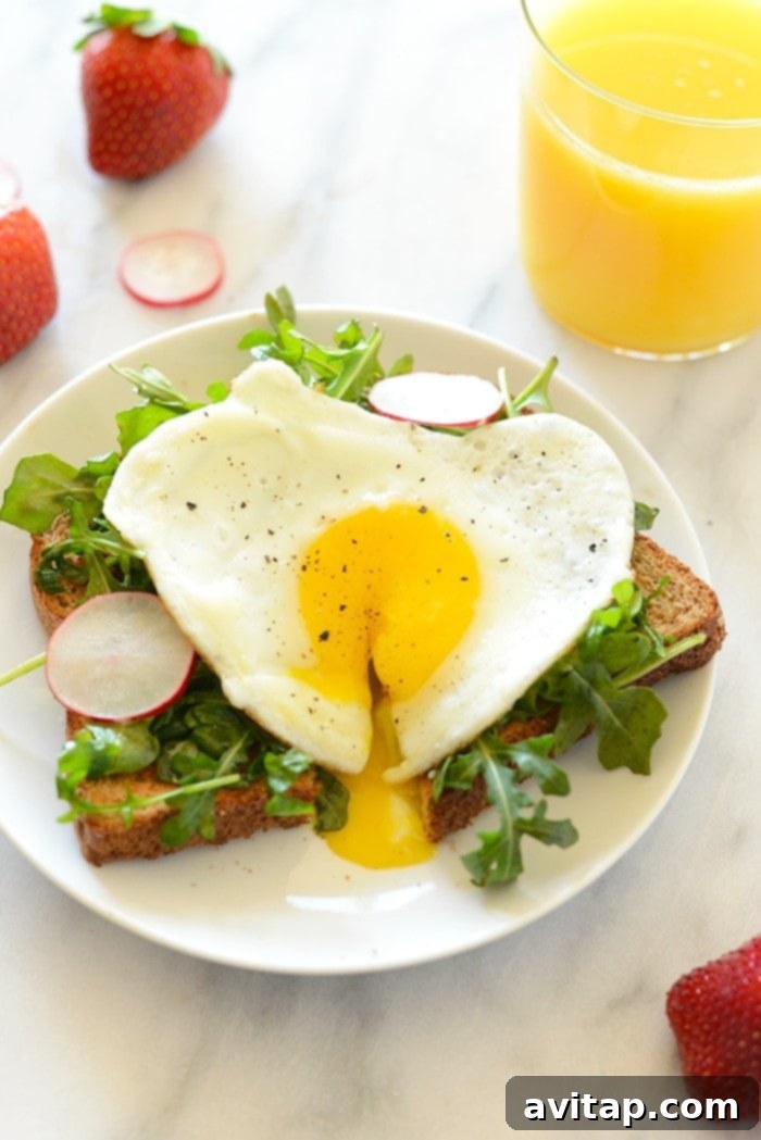 Toast Tuesday Egg and Arugula Special 8 Another appealing image of Egg and Arugula Toast, ready to be enjoyed