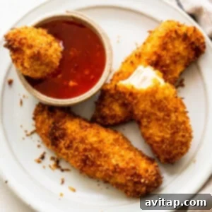 Air fryer coconut chicken tenders, beautifully golden and crispy.