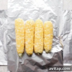 Smoky Sweet Cob 2 Grilled corn in foil, a convenient alternative.